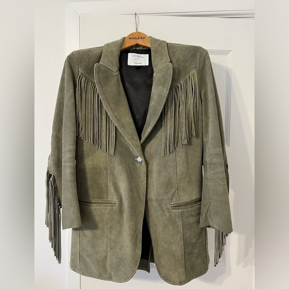 Understated Marlboro fringe leather jacket.